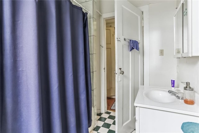 2226 Saint Bernard Ave, New Orleans, LA 70119 - bathroom featuring tile patterned floors and vanity