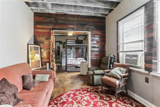 2226 Saint Bernard Ave, New Orleans, LA 70119 - living area with wood walls, wood finished floors, and cooling unit
