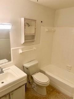 full bathroom featuring vanity, toilet, and shower / bath combination