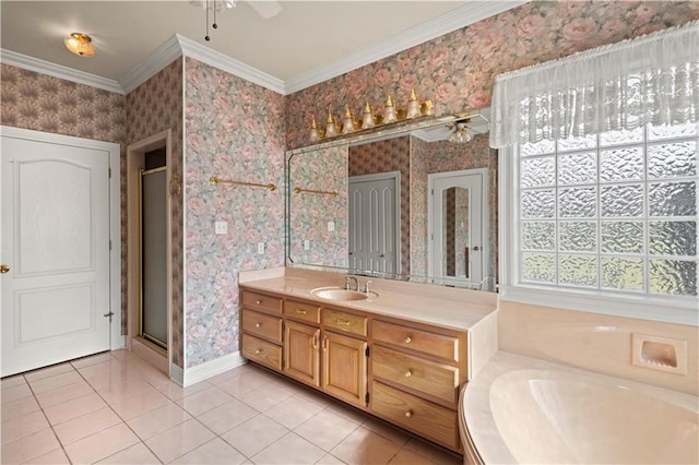 bathroom with ceiling fan, ornamental molding, plus walk in shower, and vanity