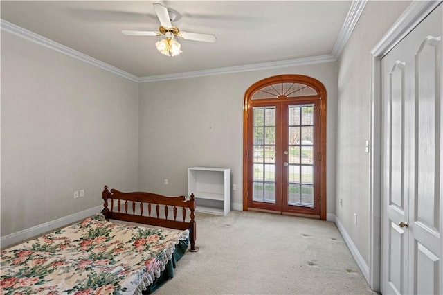 bedroom featuring ceiling fan, access to exterior, ornamental molding, light carpet, and french doors