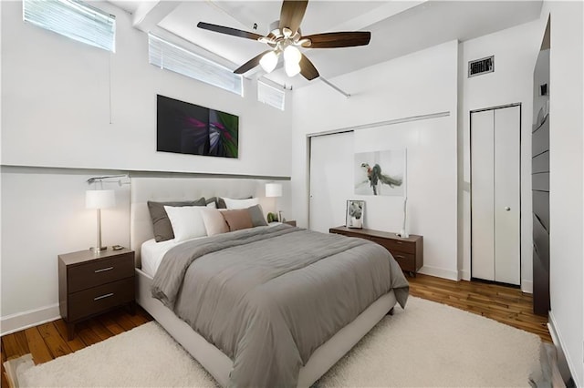 bedroom featuring ceiling fan and hardwood / wood-style floors