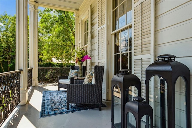 view of patio featuring a porch