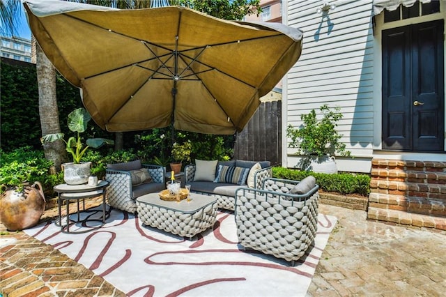 view of patio / terrace with an outdoor hangout area and french doors