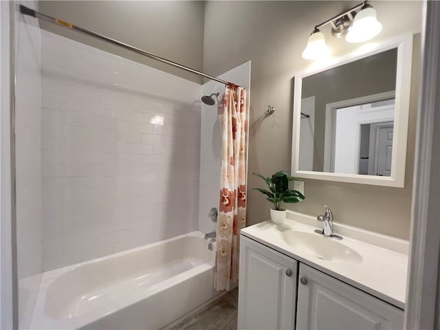 bathroom with vanity and shower / tub combo