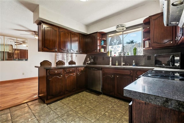 2027 Comet St, New Orleans, LA 70131 - kitchen with dishwasher, open shelves, black microwave, and dark countertops