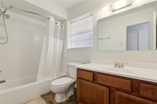 full bathroom with vanity, toilet, and shower / bath combo with shower curtain