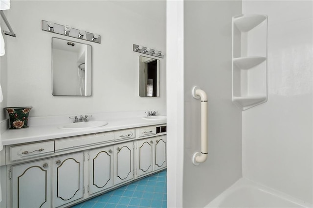 bathroom featuring shower / bath combination and vanity