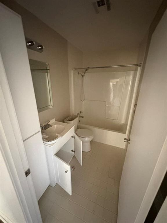 full bathroom with vanity, tile patterned flooring, toilet, and bathtub / shower combination