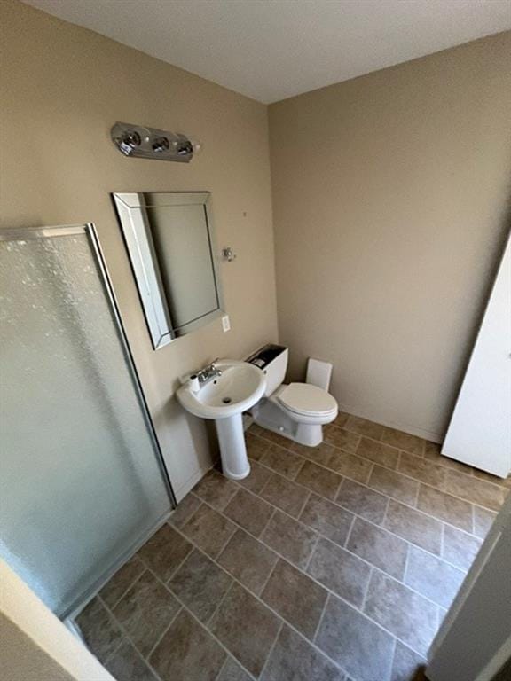 bathroom with sink and toilet