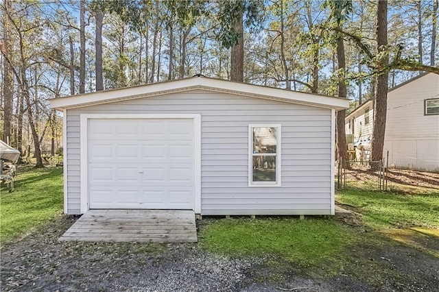 garage with a yard