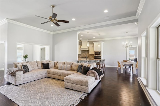 living room with crown molding and dark hardwood / wood-style floors