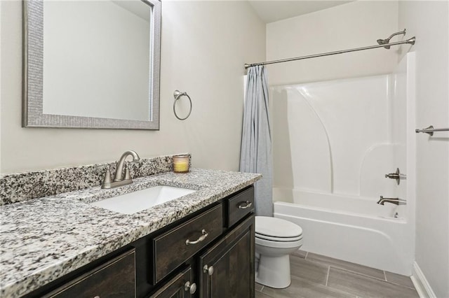 full bathroom with toilet, vanity, and shower / bathtub combination with curtain