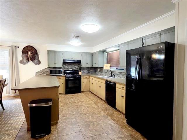 kitchen featuring black appliances, decorative backsplash, crown molding, sink, and kitchen peninsula