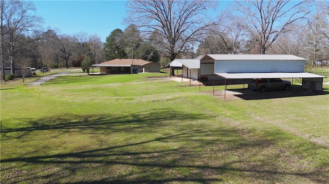 view of yard featuring a carport