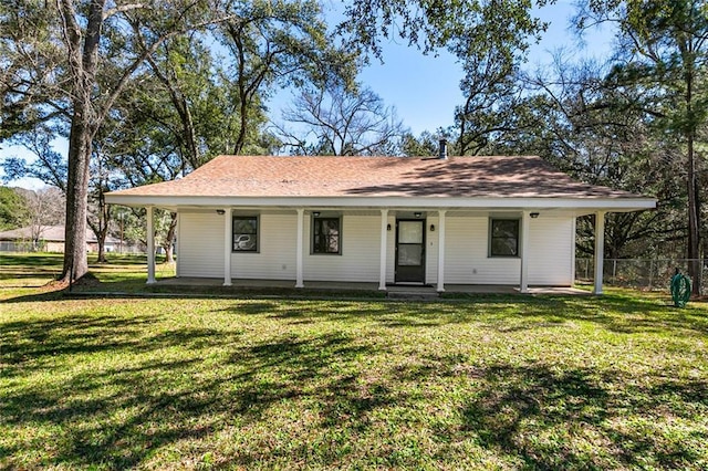 view of front of property with a porch and a front lawn