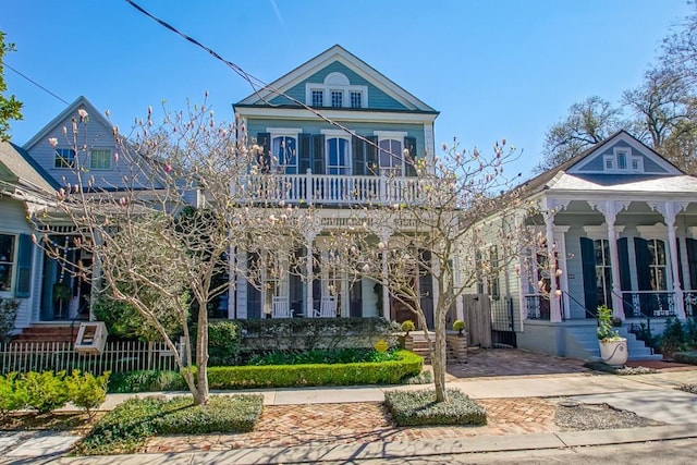 victorian-style house featuring a balcony