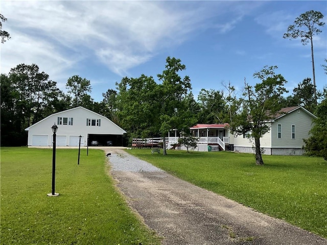 57428 Mainegra Rd, Slidell, LA 70460 - exterior space with aphalt driveway