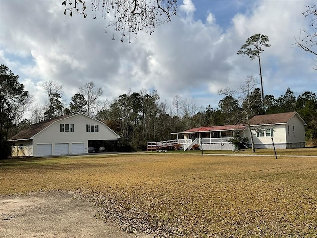 57428 Mainegra Rd, Slidell, LA 70460 - view of yard featuring a detached garage