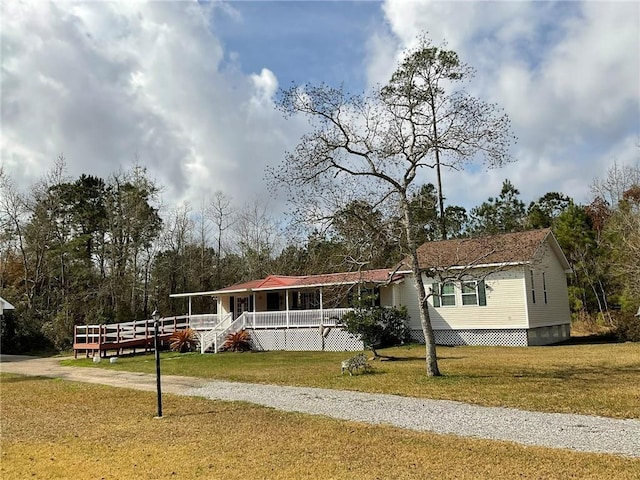 57428 Mainegra Rd, Slidell, LA 70460 - view of front facade featuring a front lawn