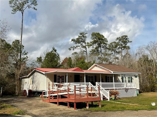 57428 Mainegra Rd, Slidell, LA 70460 - back of house with covered porch