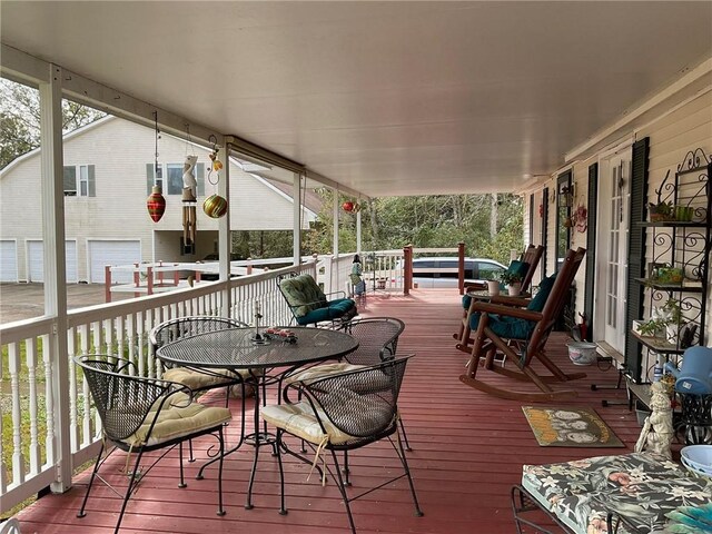 57428 Mainegra Rd, Slidell, LA 70460 - wooden terrace featuring outdoor dining area