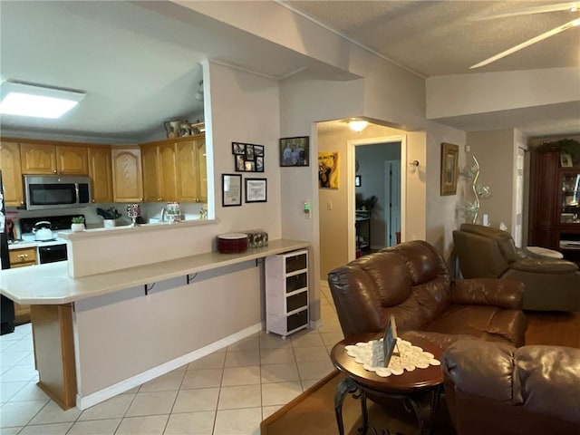 57428 Mainegra Rd, Slidell, LA 70460 - living room featuring light tile patterned floors and beverage cooler