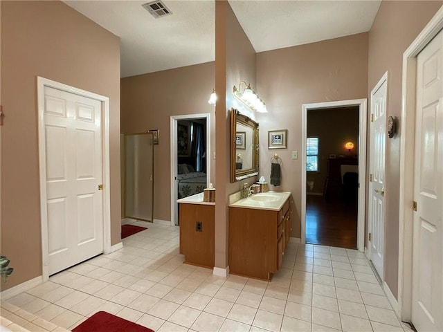 57428 Mainegra Rd, Slidell, LA 70460 - full bath featuring visible vents, baseboards, tile patterned flooring, and vanity