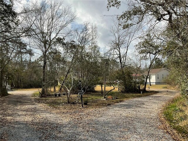 57428 Mainegra Rd, Slidell, LA 70460 - view of street featuring gravel driveway