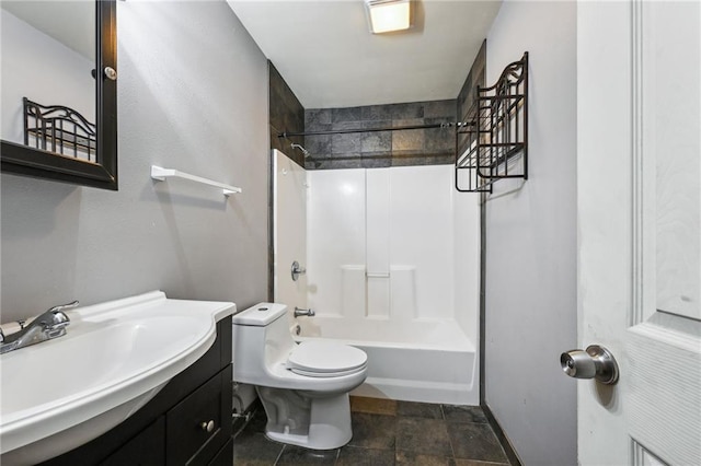 bathroom with toilet, vanity, and bathing tub / shower combination