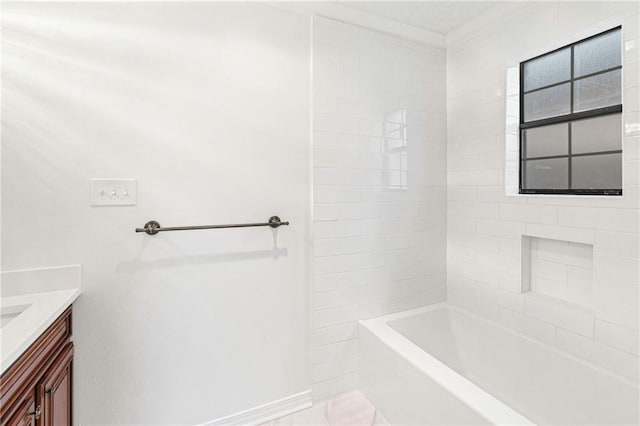 bathroom featuring vanity and shower / bath combination