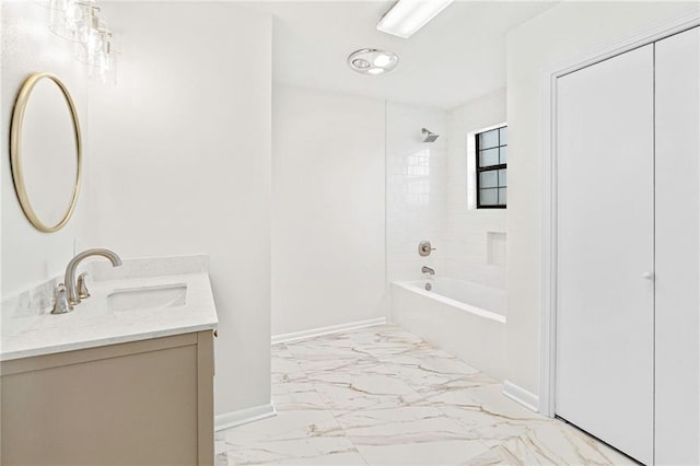 bathroom featuring vanity, shower / bathing tub combination, baseboards, and marble finish floor