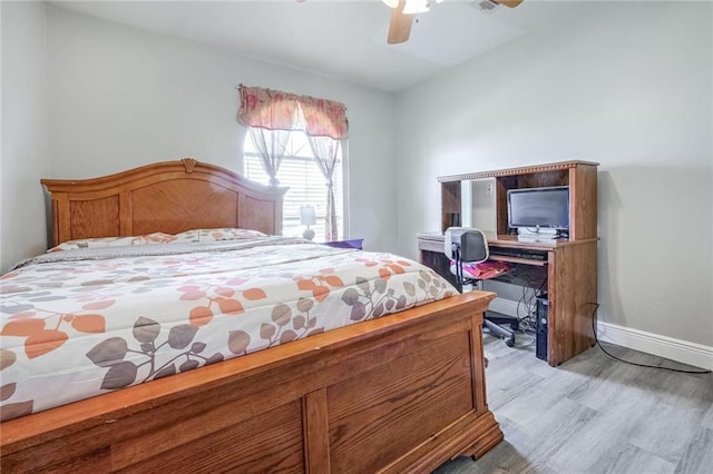 bedroom featuring ceiling fan and light hardwood / wood-style flooring