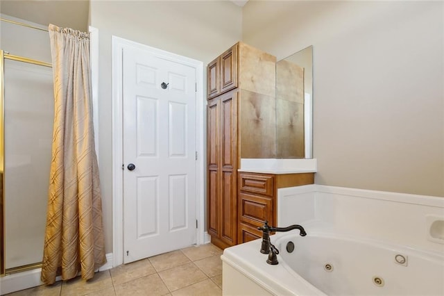 bathroom with plus walk in shower and tile patterned flooring