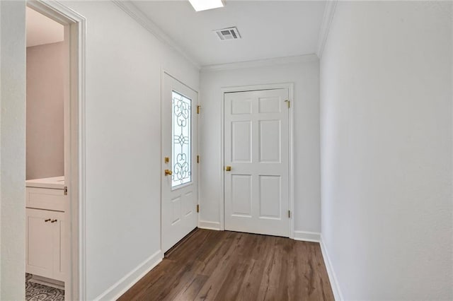 entryway featuring crown molding and dark hardwood / wood-style flooring