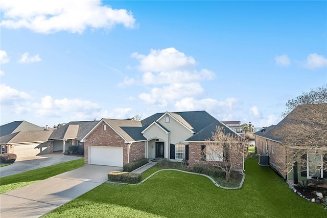 view of front facade with central AC, a front lawn, and a garage