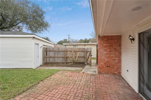 view of patio featuring an outdoor structure