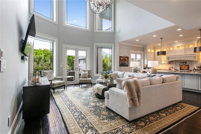 501 Emerald St, New Orleans, LA 70124 - living room with plenty of natural light, a towering ceiling, and dark wood-style floors