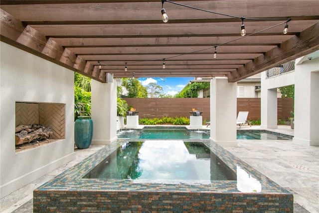501 Emerald St, New Orleans, LA 70124 - view of pool featuring fence, a patio, and a pool with connected hot tub