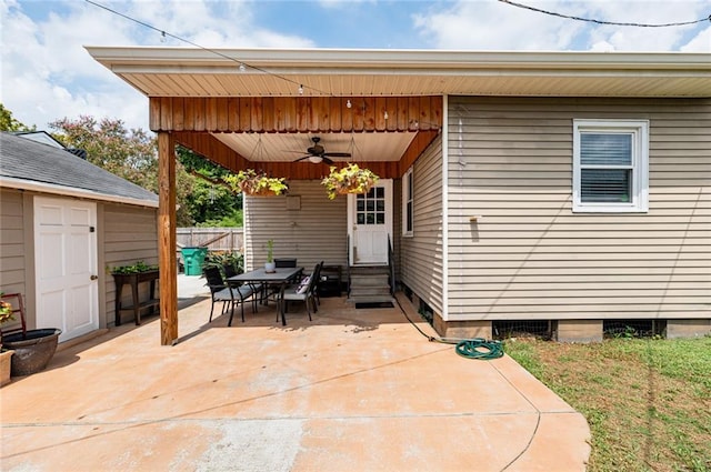 view of patio featuring ceiling fan