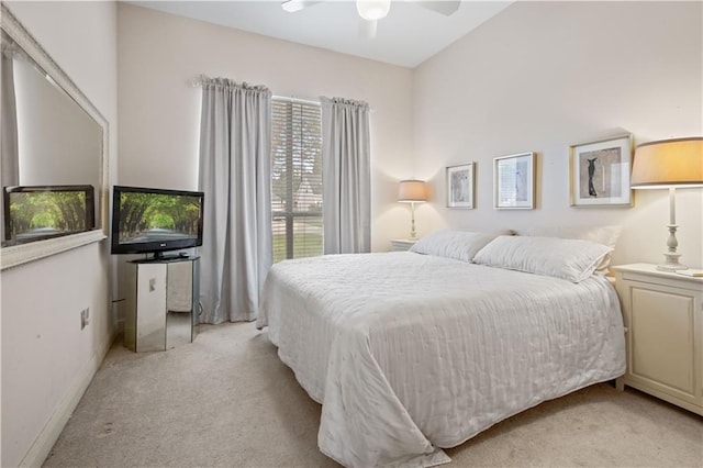 2021 W Ridge Dr, Mandeville, LA 70448 - bedroom featuring light colored carpet, a ceiling fan, and baseboards