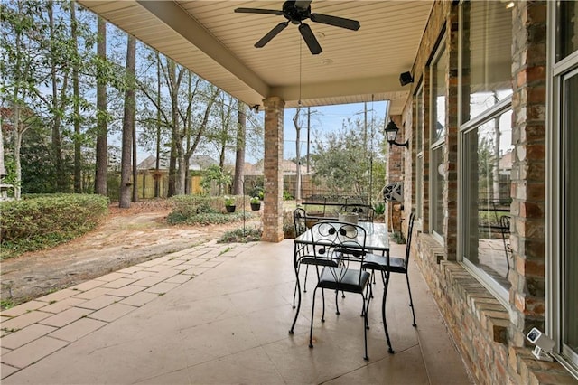 view of patio featuring ceiling fan