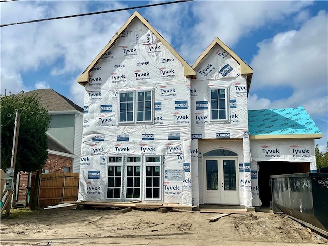 property in mid-construction featuring french doors
