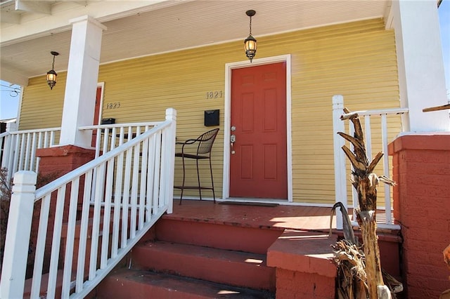 entrance to property with a porch