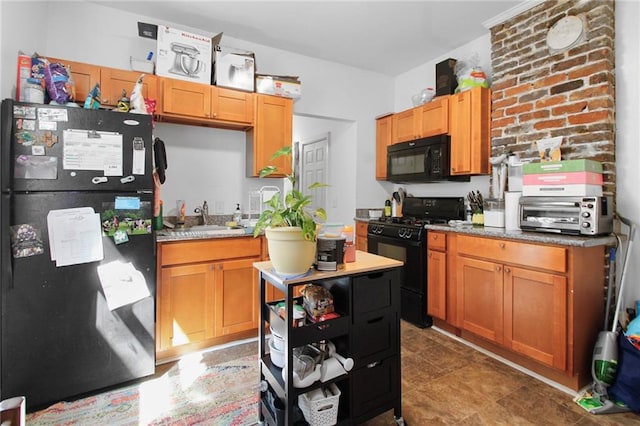 kitchen with sink and black appliances