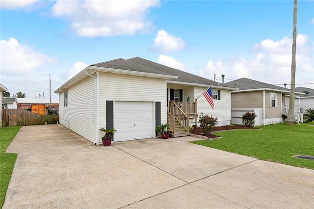 ranch-style house with a front yard and a garage