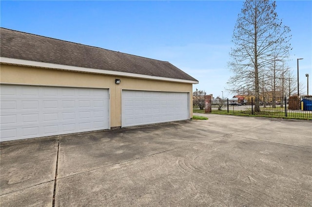 10600 Lakes Blvd Unit 901, Baton Rouge, LA 70810 - garage featuring fence