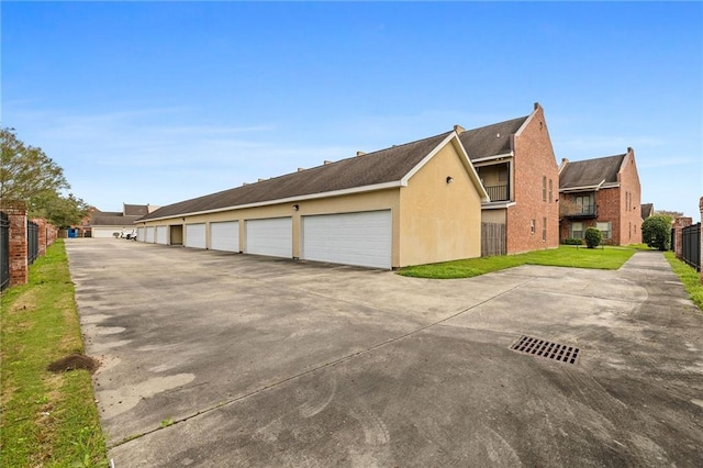 10600 Lakes Blvd Unit 901, Baton Rouge, LA 70810 - view of home's exterior with community garages