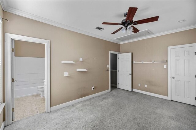 10600 Lakes Blvd Unit 901, Baton Rouge, LA 70810 - unfurnished bedroom with attic access, carpet, ornamental molding, baseboards, and connected bathroom