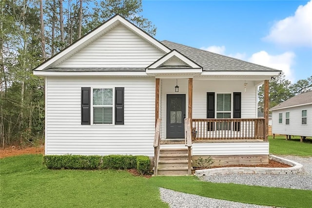 view of front of property with a front lawn and a porch